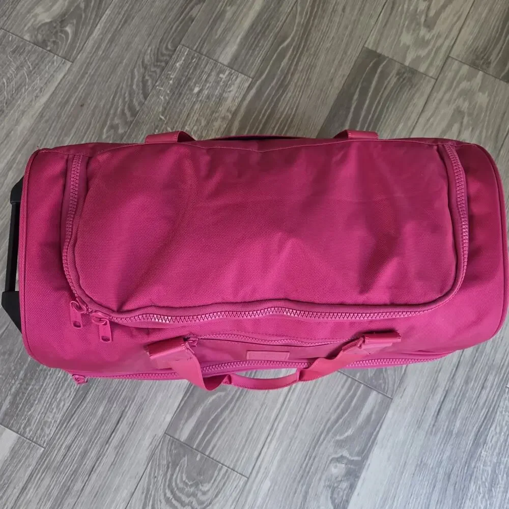 Calpak Stevyn Rolling Duffel Dragonfruit Pink Luggage Travel Wheeled